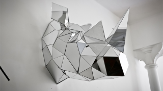 Illustration for article titled Giant Polygon Animals Come to Life (It's OK, They Won't Eat Your Face)